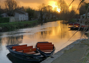 Coucher Soleil barque Prada